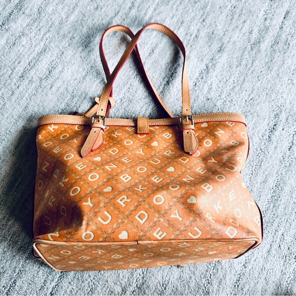 Dooney & Bourke Tangerine East/West Bucket
Tote Bag - Picture 6 of 14